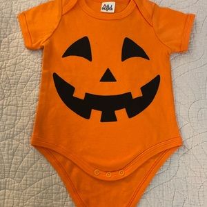 A&J Design Jack o lantern one piece snap T-shirt